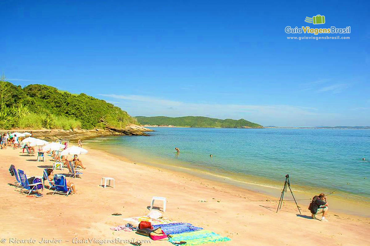 Imagem de um fotografo registrado a beleza do local.